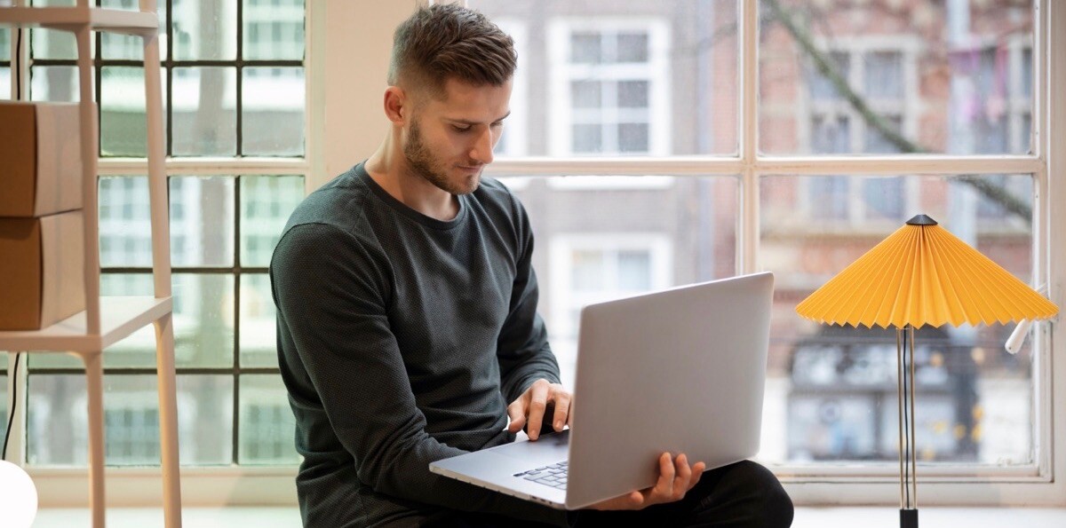 Developer working near window