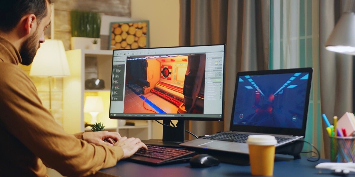 Male developer typing on keyboard