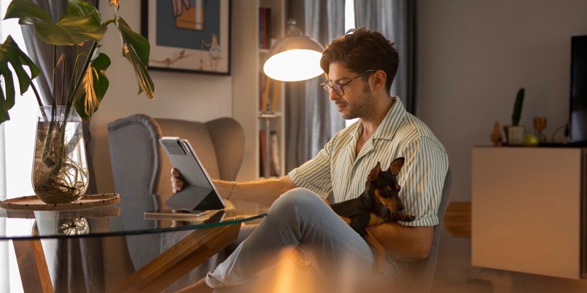Developer working from home with pet dog