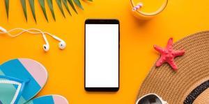 Flat lay smartphone with summer vacation concept