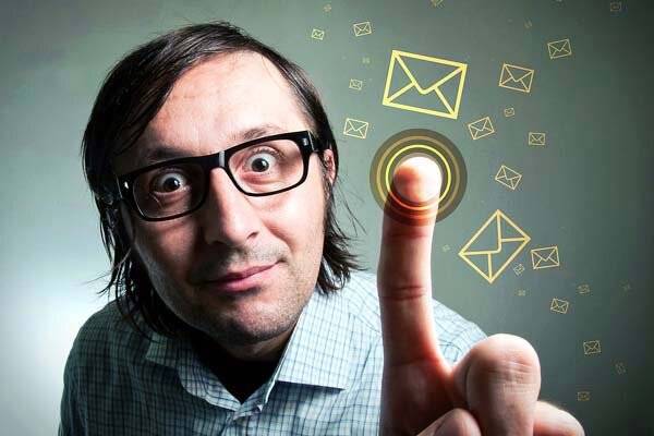 Man touching screen to read emails